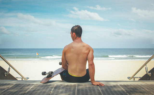 Man at beach being mindful